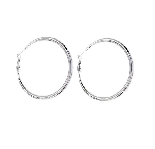 SODABIJOUX - Steel earrings - asymmetrical domed