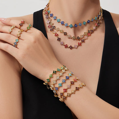 SODABIJOUX - Collana girocollo tennis fiori acciaio base oro e pietre colorate