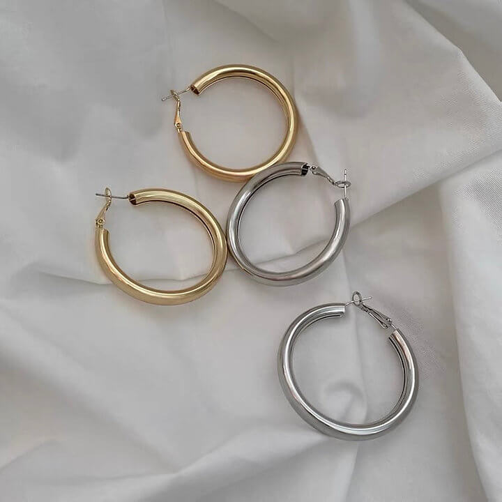 SODABIJOUX - Smooth chubby circle steel earrings