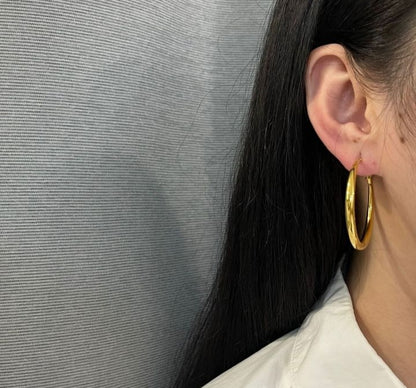 SODABIJOUX - Steel earrings - asymmetrical domed